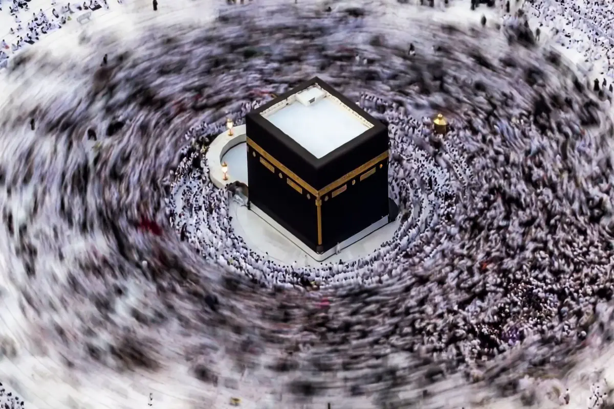 The Kaaba seen from above, with the pilgrims circling it blurred by a long exposure